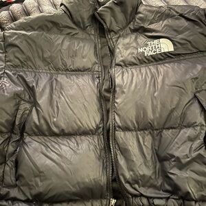 The Cropped North Face Black Puffer Jacket